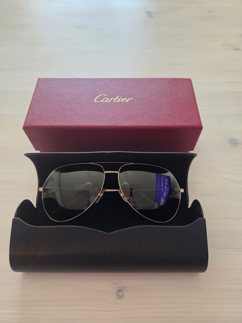 Cartier Gold Frame Sunglasses with Dark Gray Lenses